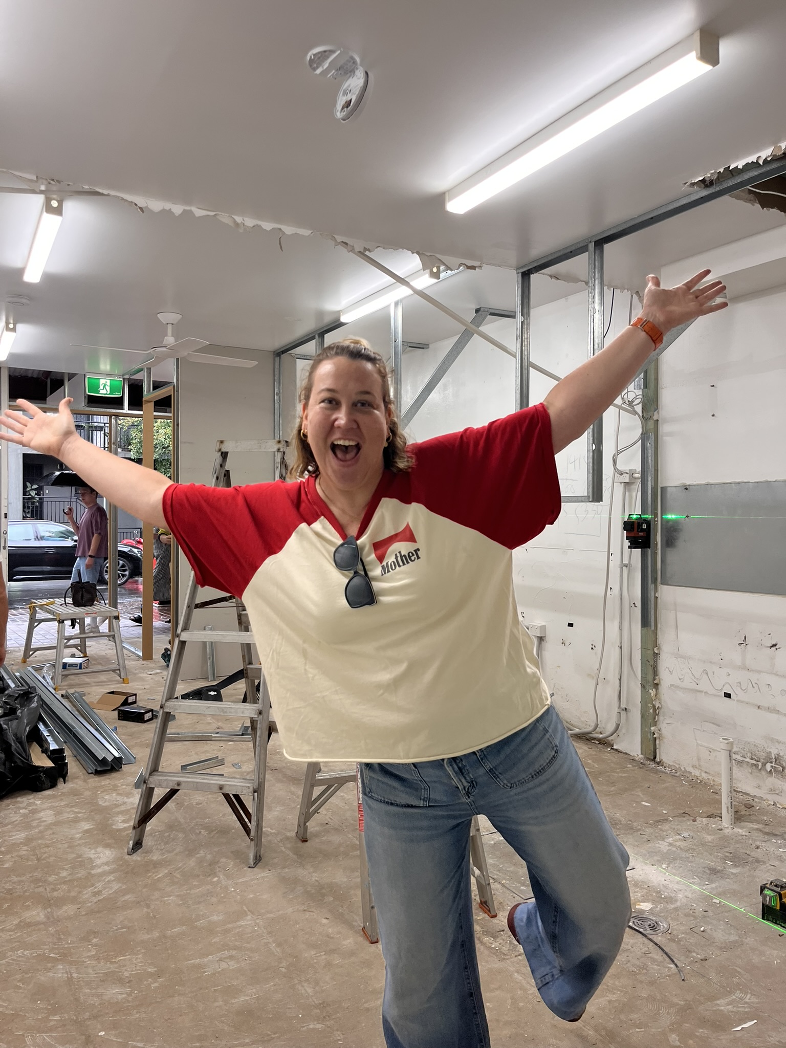 Charity Handley on-site during laundromat construction